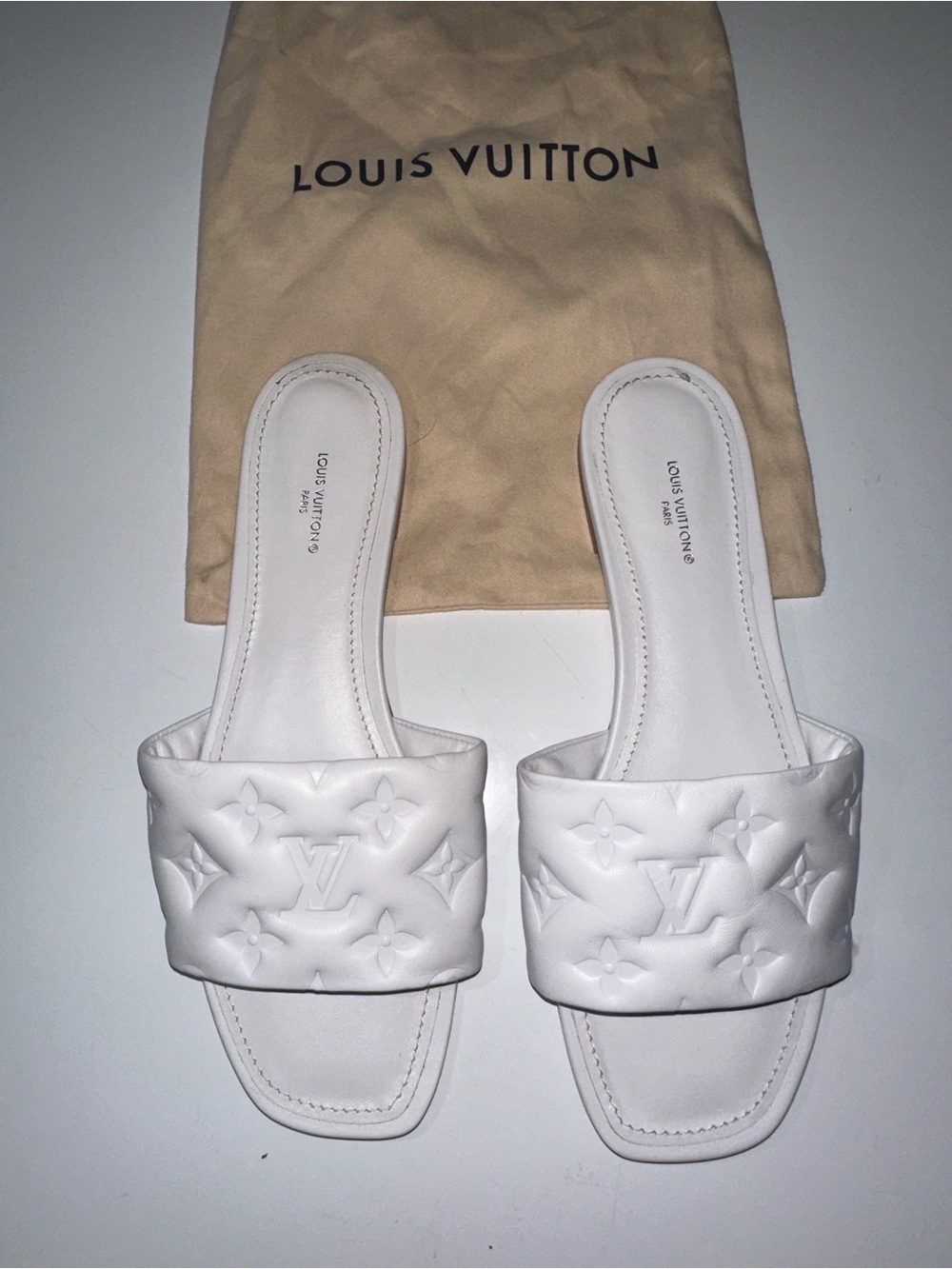 Louis Vuitton White Embossed Monogram Slide Mules Size 40